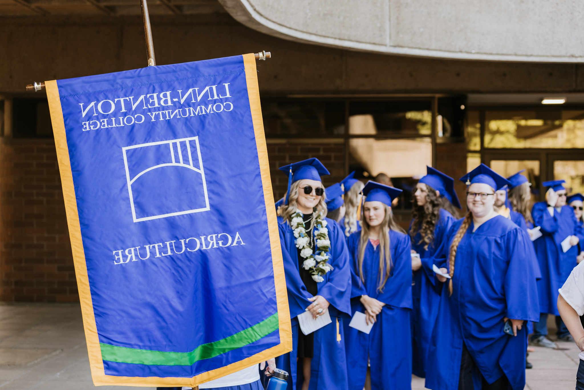 Photo of agriculture students walking at commencement